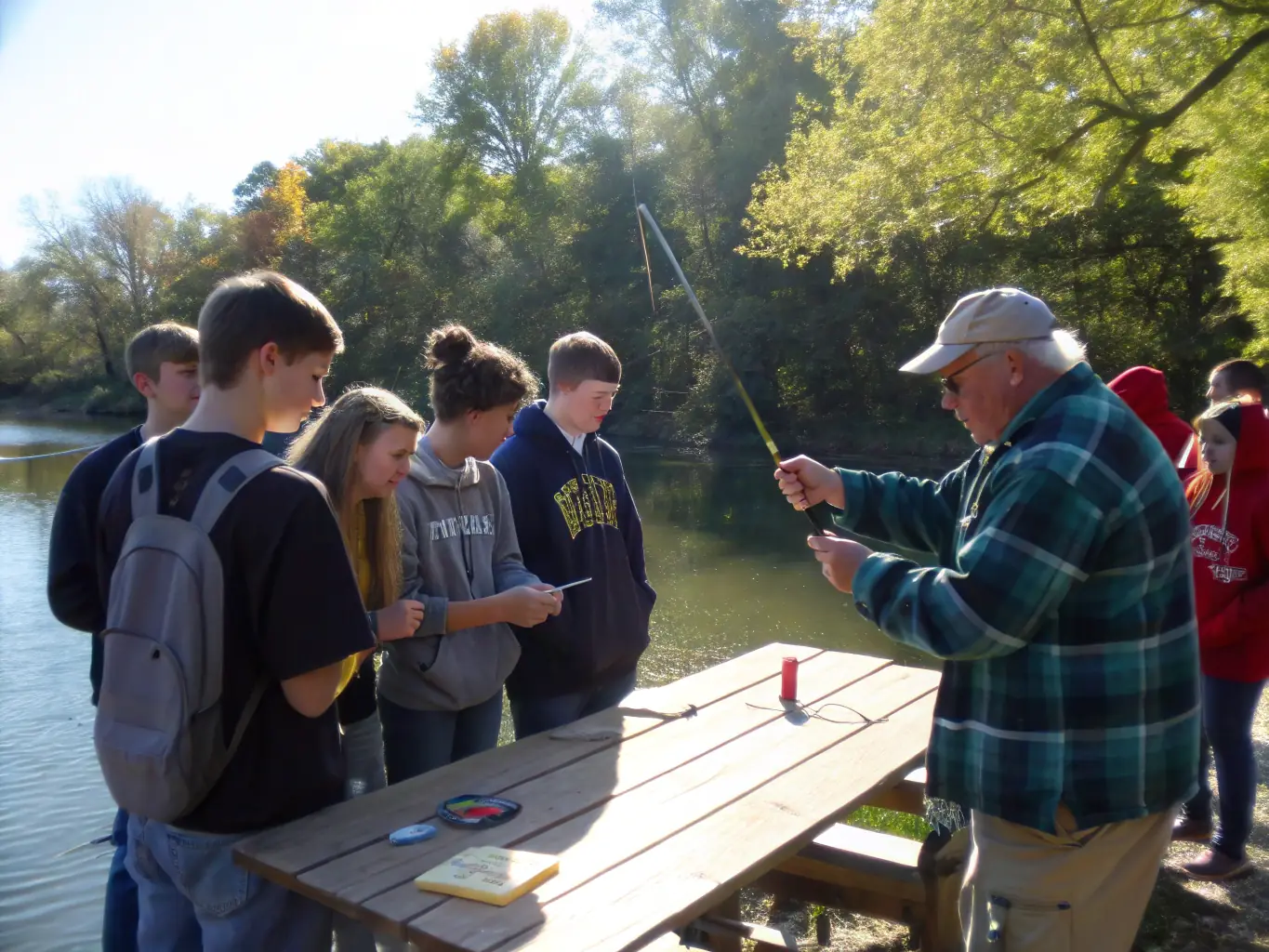 An educational workshop where experts are teaching community members about sustainable fishing techniques and the importance of conservation.